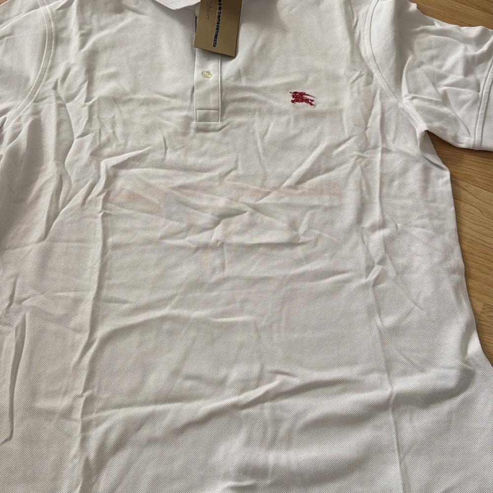 White Polo Shirt with Red Logo